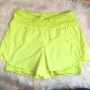 Yellow running shorts higher waist for tummy control- very flattering